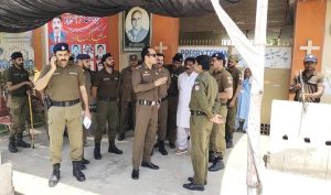 Police-guard-Presbyterian-church-building-in-Sargodha-Pakistan-on-Sunday-May-26-2024.