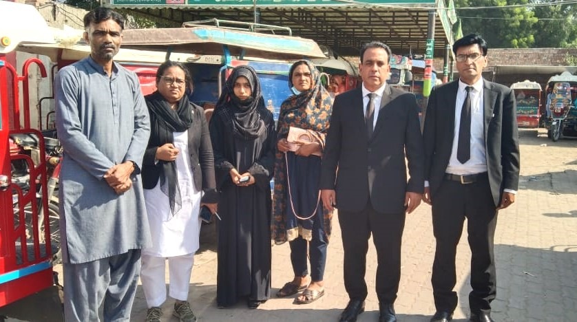 Diya Iftikhar with her parents and lawyers